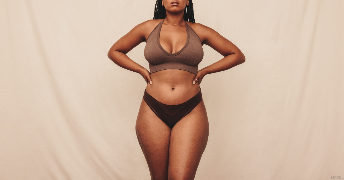 Body confident woman after body contouring (model)